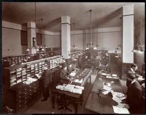 Young men working in a mailroom at the Metropolitan Life Insurance Co. at 23rd Street and Madison Avenue, New York, 1907